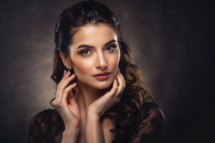 Woman with glowing healthy skin representing beauty from within concept