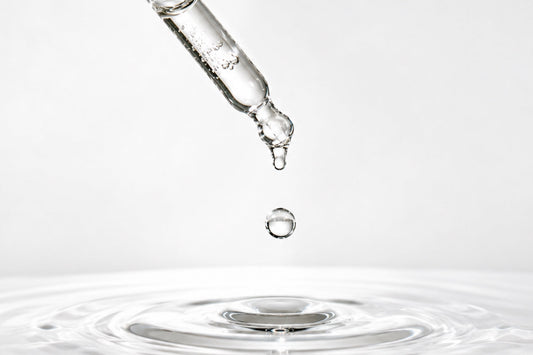 Liquid drop from a dropper illustrating how liquid supplements are designed for convenient use and everyday nutrient delivery