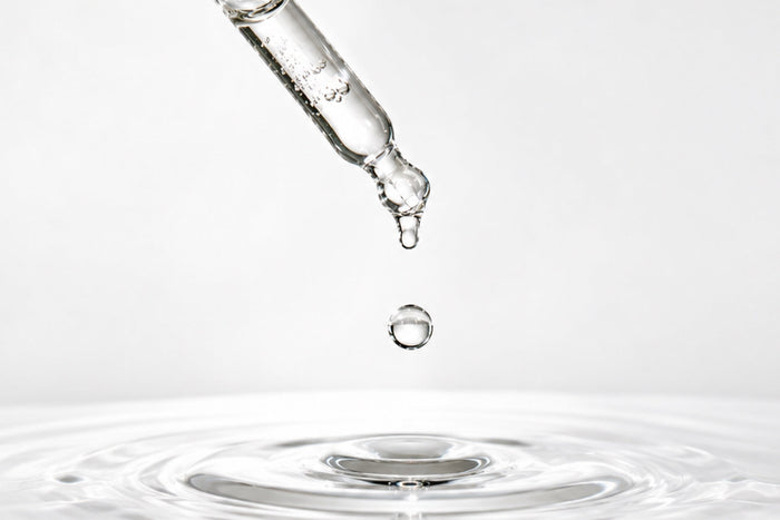 Liquid drop from a dropper illustrating how liquid supplements are designed for convenient use and everyday nutrient delivery